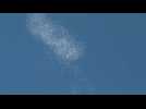 Israeli forces drop thousands of flyers in Gaza Strip sky