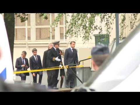 France's Macron arrives at school where teacher stabbed to death