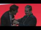 Protester disrupts start of UK opposition leader's conference speech