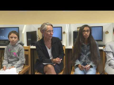 French PM visits a secondary school near Paris to combat cyberbullying