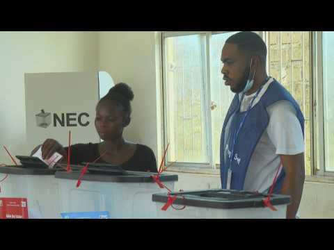 Polls open in Liberia presidential, legislative elections