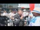 Riot police disperse protesters outside McDonald's in Guatemala City