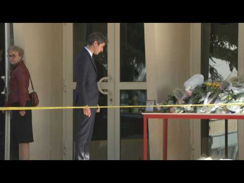 French education minister leaves school where fatal attack took place