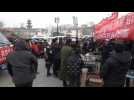 People receive food at relief camp after deadly China quake