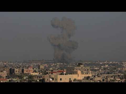 Smoke rises in Khan Yunis, seen from Rafah