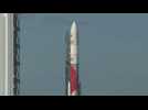 Rocket carrying American lunar lander rolls to launchpad