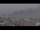Smoke rises over Khan Yunis as seen from Rafah