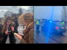 Bystanders, police vehicles near Czech university where deadly shooting occurred