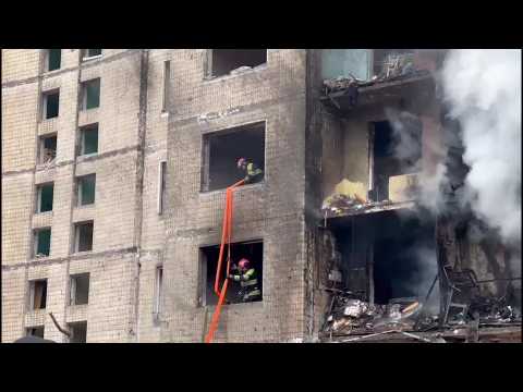 Rescuers work in aftermath of deadly Russian missile attack in Kyiv