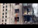Rescuers work in aftermath of deadly Russian missile attack in Kyiv
