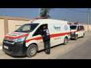 Aid trucks and ambulances in Gaza's Rafah