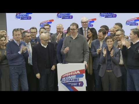 Serbian president Aleksandar Vucic arrives at his party headquarters