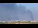 Smoke curtains and Israeli strikes in central Gaza Strip