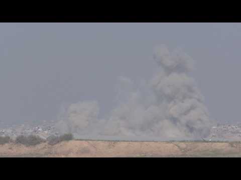 Smoke billows from northern Gaza, seen from Israel's Sderot