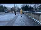 Thin layer of snow covers Paris outskirt for morning commute