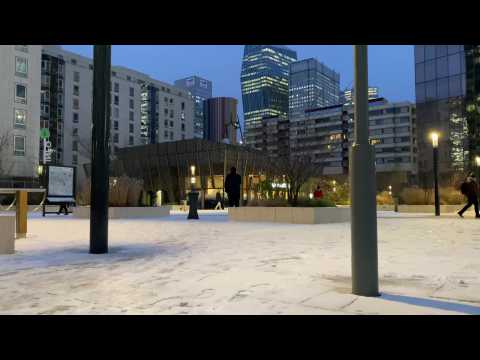 Paris wakes up to thin layer of snow