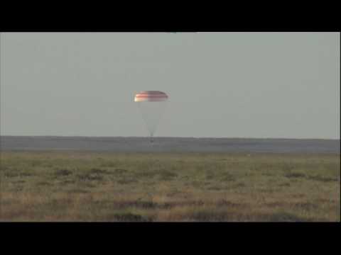 Russian, French astronauts back on Earth from ISS