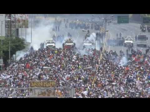 Security forces fire tear gas at big Venezuela demo