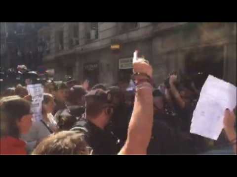 Angry protests in Barcelona as police detain Catalan officials