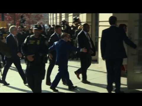 Ex-Trump aide Flynn arrives in court, charged with lying to FBI