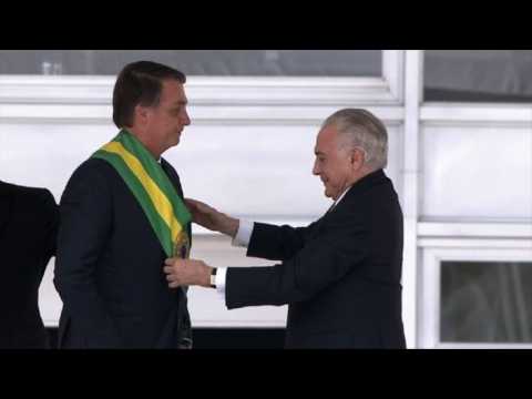 Brazil's Bolsonaro receives presidential sash from Michel Temer