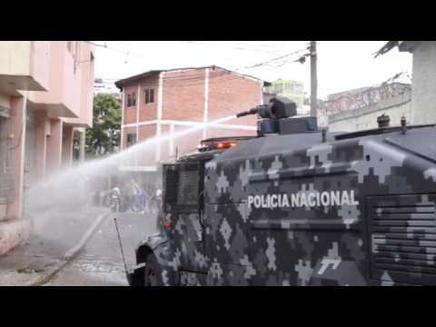 Police fire tear gas and water cannon during protest in Honduras