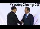 North and South Korea heads of state meet, shake hands