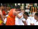 Thai cave boys get hair clipped in Buddhist ceremony