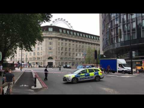 Police respond to car crash into barriers at British Parliament