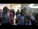Tourists and locals evacuate after quake hits Indonesia