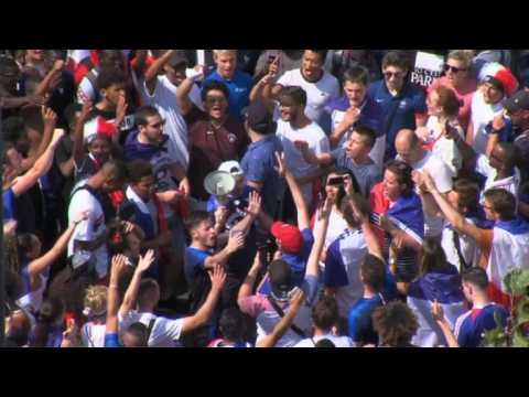 France fans fill Paris's Champs Elysees for victory parade