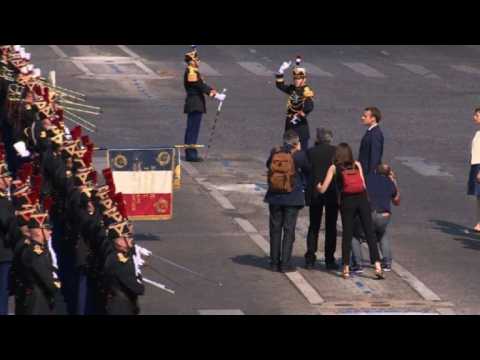 Emmanuel Macron arrives at the Champs Elysees for Bastille Day