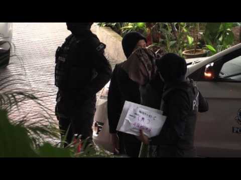 Suspects in Kim Jong Nam murder trial arrive at Malaysia court