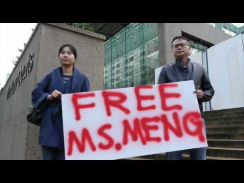 People line up outside court ahead of Huawei bail decision