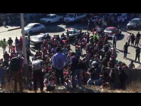 Migrants attempt to cross US-Mexico border fence
