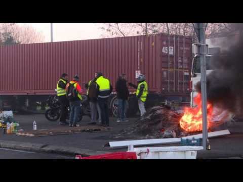 Anti-fuel hike protesters block trucks in northern France