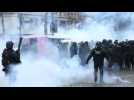 Riot police fire tear gas at 'yellow vest' protesters in Paris