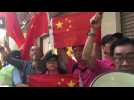 Protests in Hong Kong as Xi swears in new leader