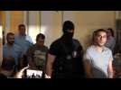 Suspects arrive at migrant death truck trial in Hungary
