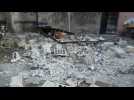 Deadly suicide bombings hit Damascus police station