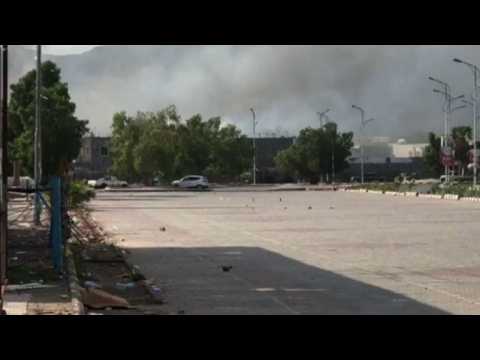 Twin suicide attacks hit Yemen security buildings: official