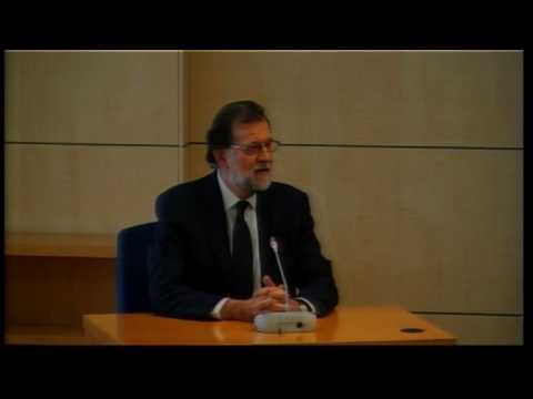 Spanish PM takes stand as witness in graft trial