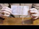 How to master the rubber band paperclip trick