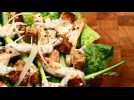 Healthy chicken Caesar salad with Parmesan and mustard dressing