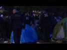 Police move over 1,000 migrants from makeshift Paris camp