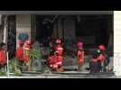 Rescuers search the Mercure Hotel in Palu