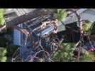 Fallen trees, damaged buildings and debris after Michael