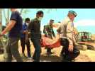 Mass burial held in Palu for quake and tsunami victims