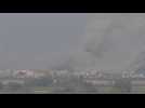 Large clouds of smoke after strikes on central Gaza