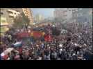 Thousands crowd around aid truck in Gaza City